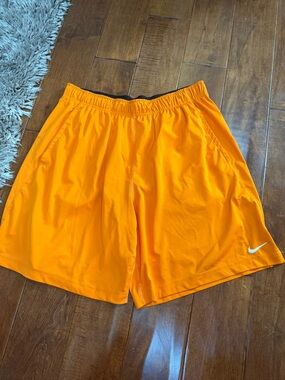 Nike Men’s Bright Orange Athletic Shorts with Swoosh